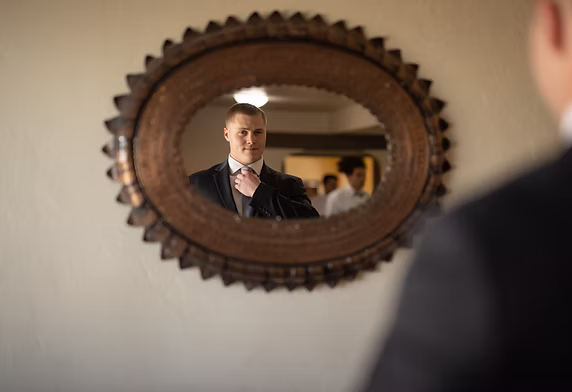 The groom getting ready